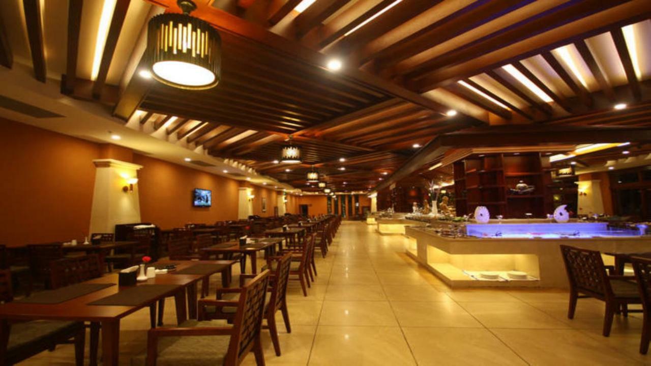 Ramada Plaza Xishuangbanna Hotel Exterior foto